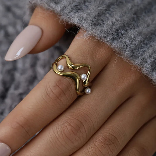 Anillo de Acero con perla y diseño geométrico