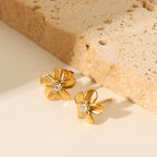 Studs de Acero con Flor y Circón Central