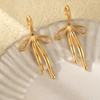 Aretes de Acero con Diseño Chongo
