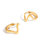 Argollas de Acero con Onda Irregular Dorada