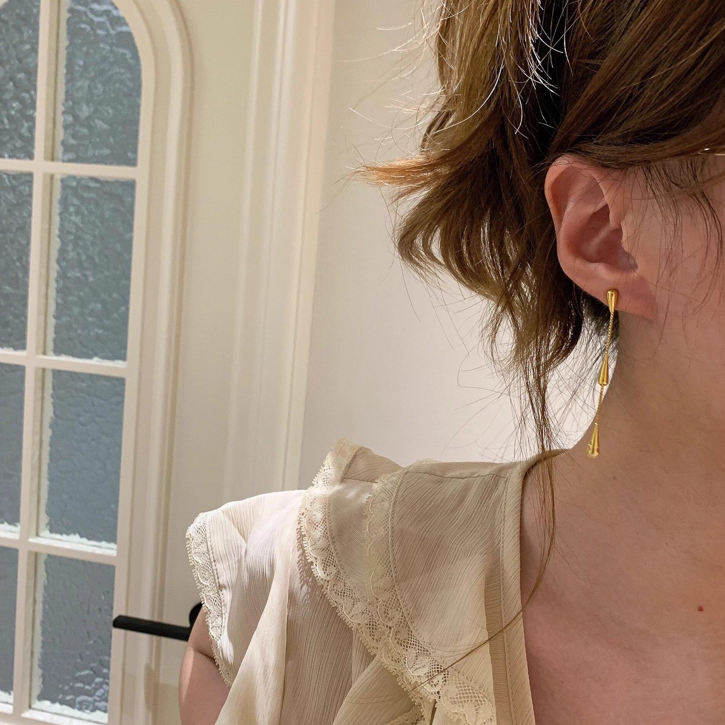 Aretes de Titanio con Detalle de Gotitas de Agua