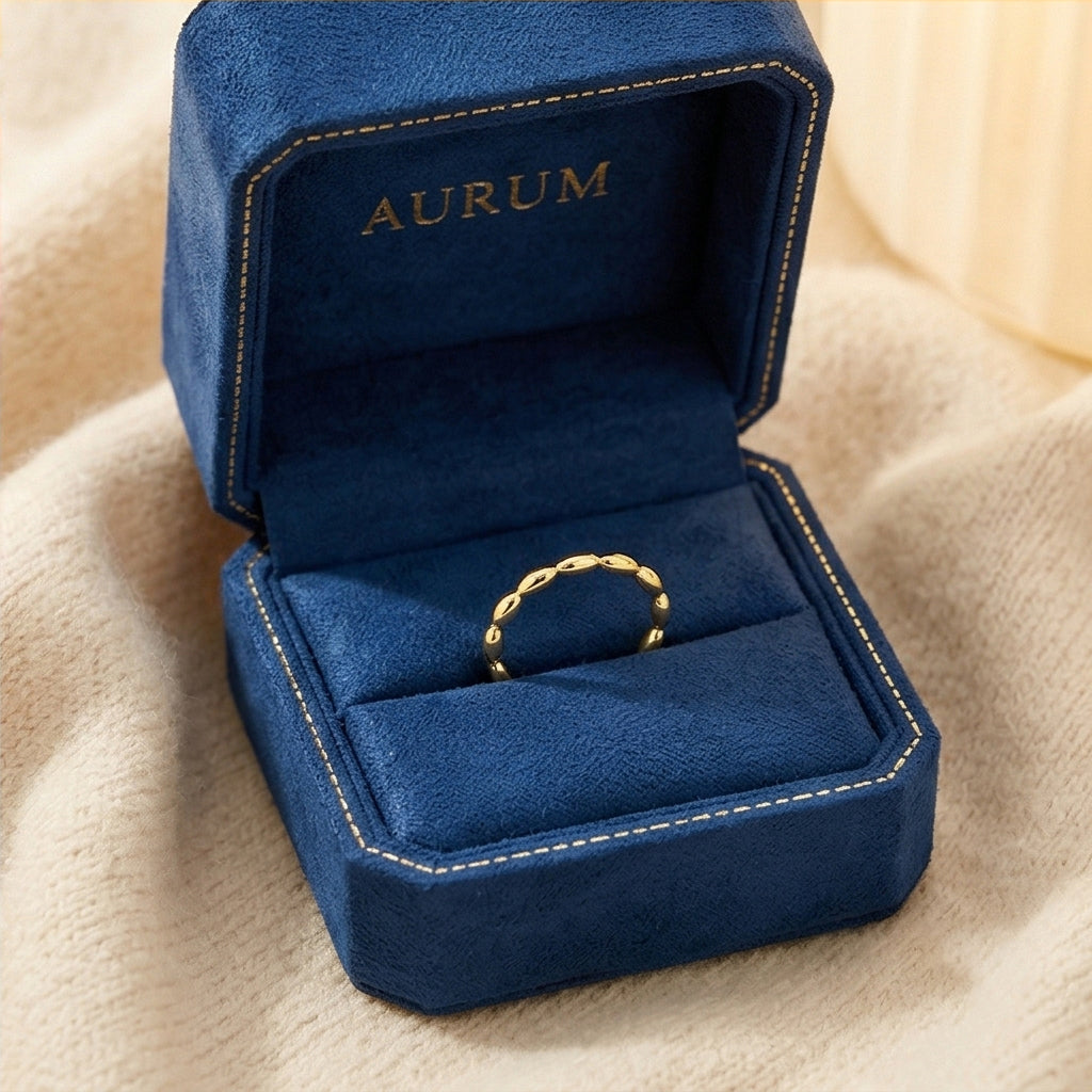 Anillo de Acero con Textura Trenzada Bañado en Oro