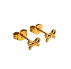 Piercings de Acero con Moño Dorado en Relieve