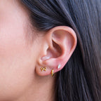 Piercings de Acero con Moño Dorado en Relieve