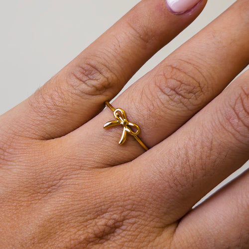 Anillo Abierto de Acero con Moño Dorado