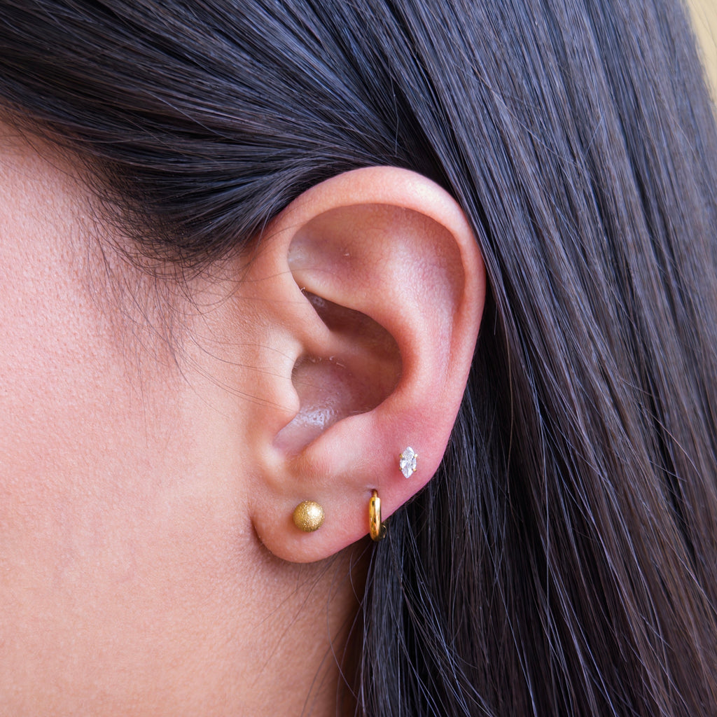 Piercings de Acero con Bola Doble — Brillo y Textura Mate