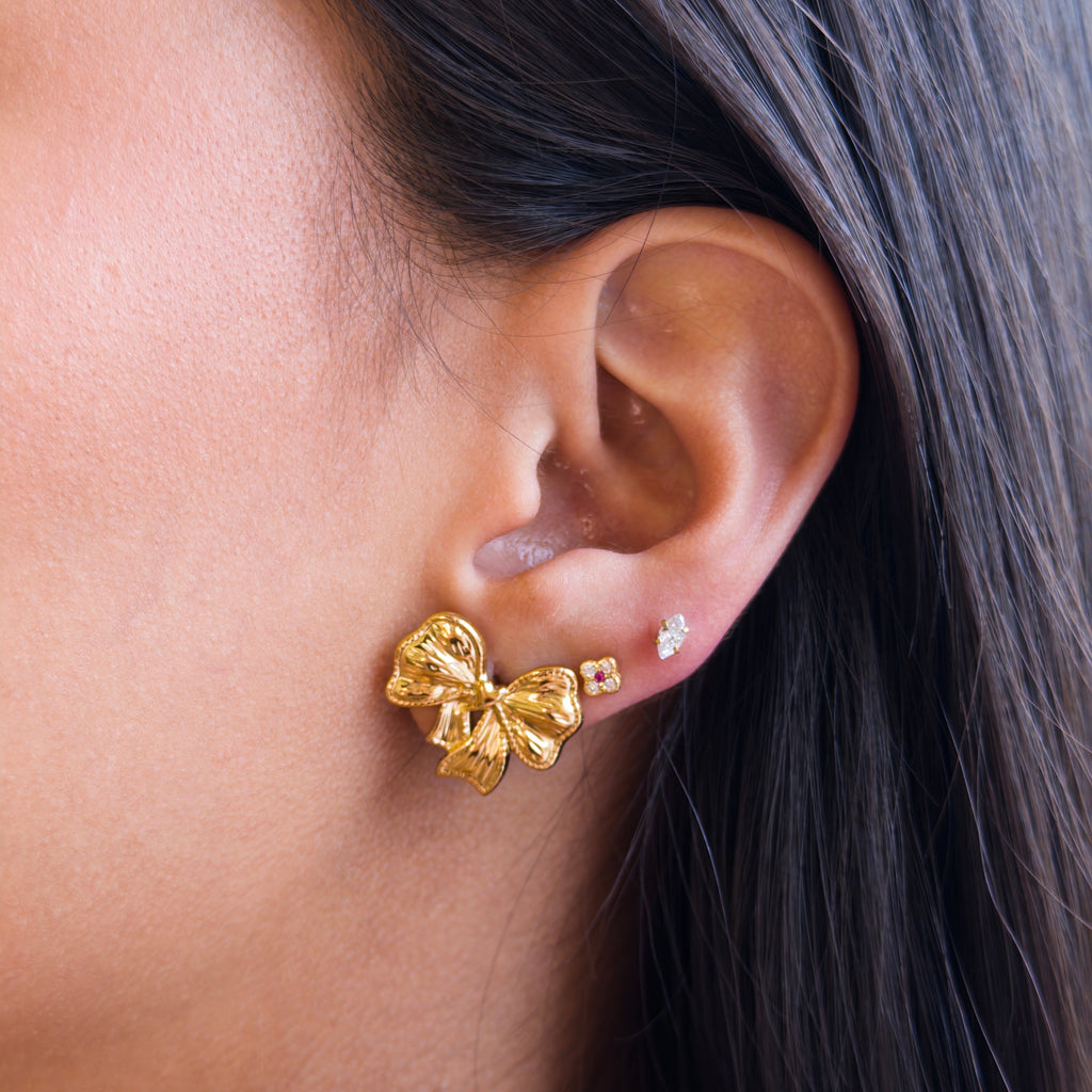 Aretes de Acero con Moño Texturizado