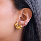 Aretes de Acero con Moño Texturizado