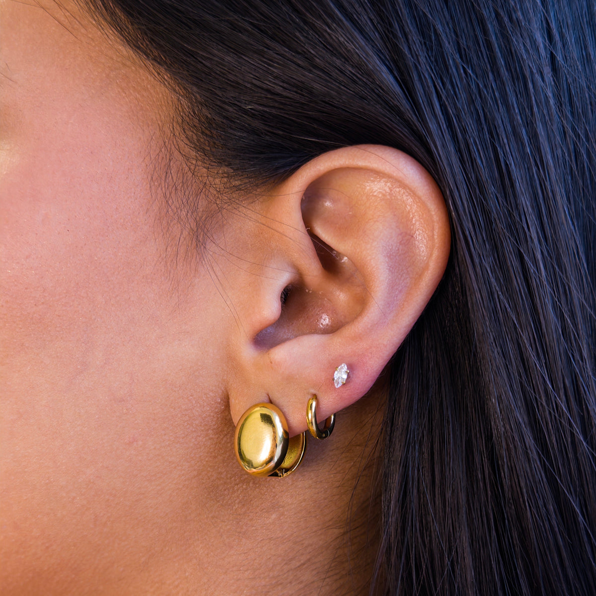 Argollas de Titanio con Domo Oval Pulido