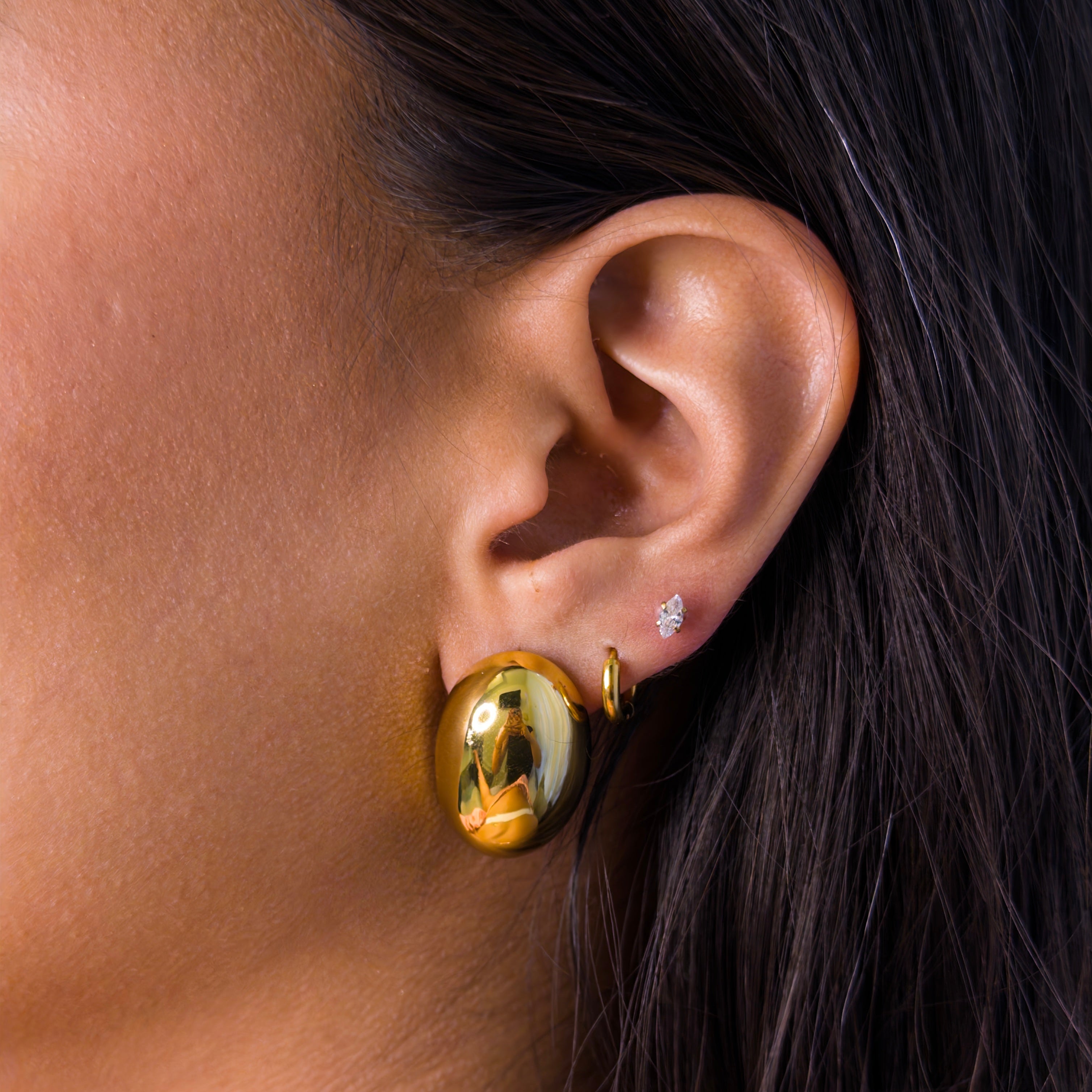 Aretes de Acero con Domo Oval Liso