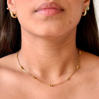 Collar de Acero con Cadena Satélite y Esferas Doradas