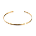 Brazalete de Acero Liso Abierto con Baño de Oro