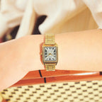 Reloj de acero dorado con esfera champagne