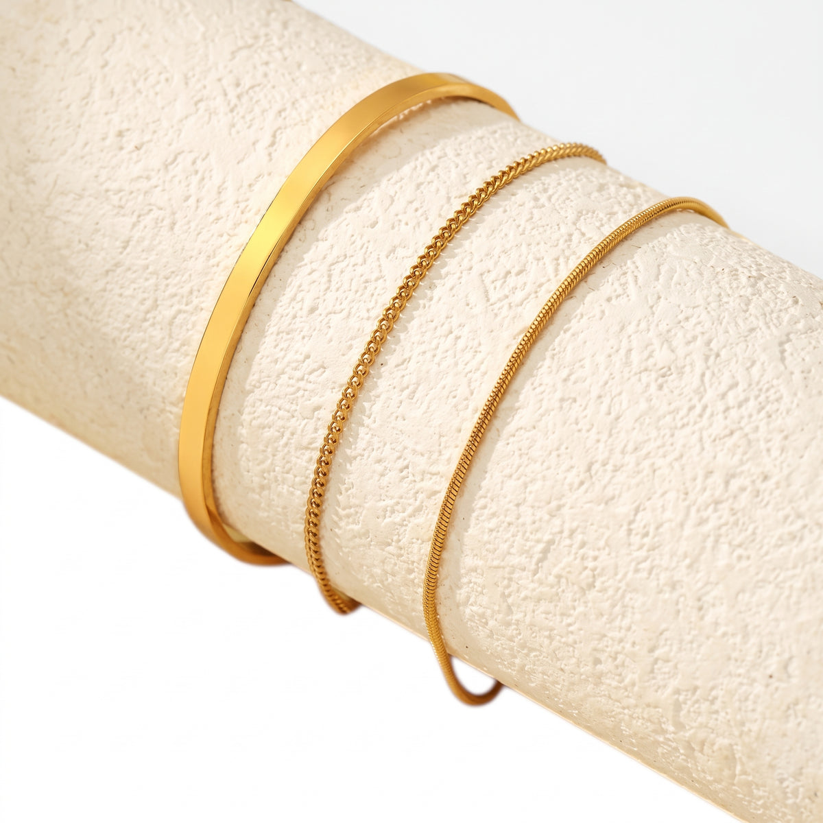 Pulseras de Acero Apilables con Distintas Texturas Doradas