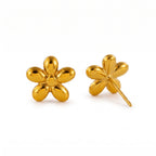 Studs de Acero con Flor Volumétrica Pulida